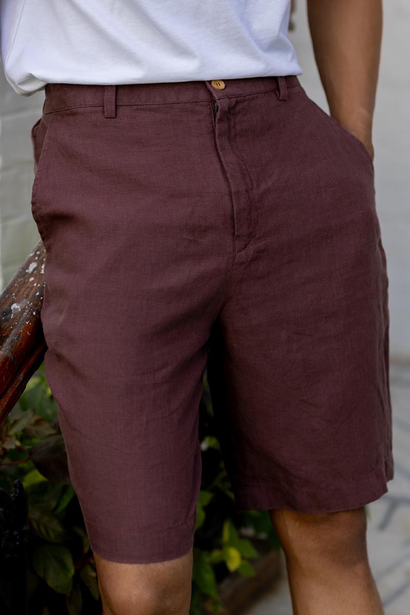 Wine Shorts worn by a person with a blurred background