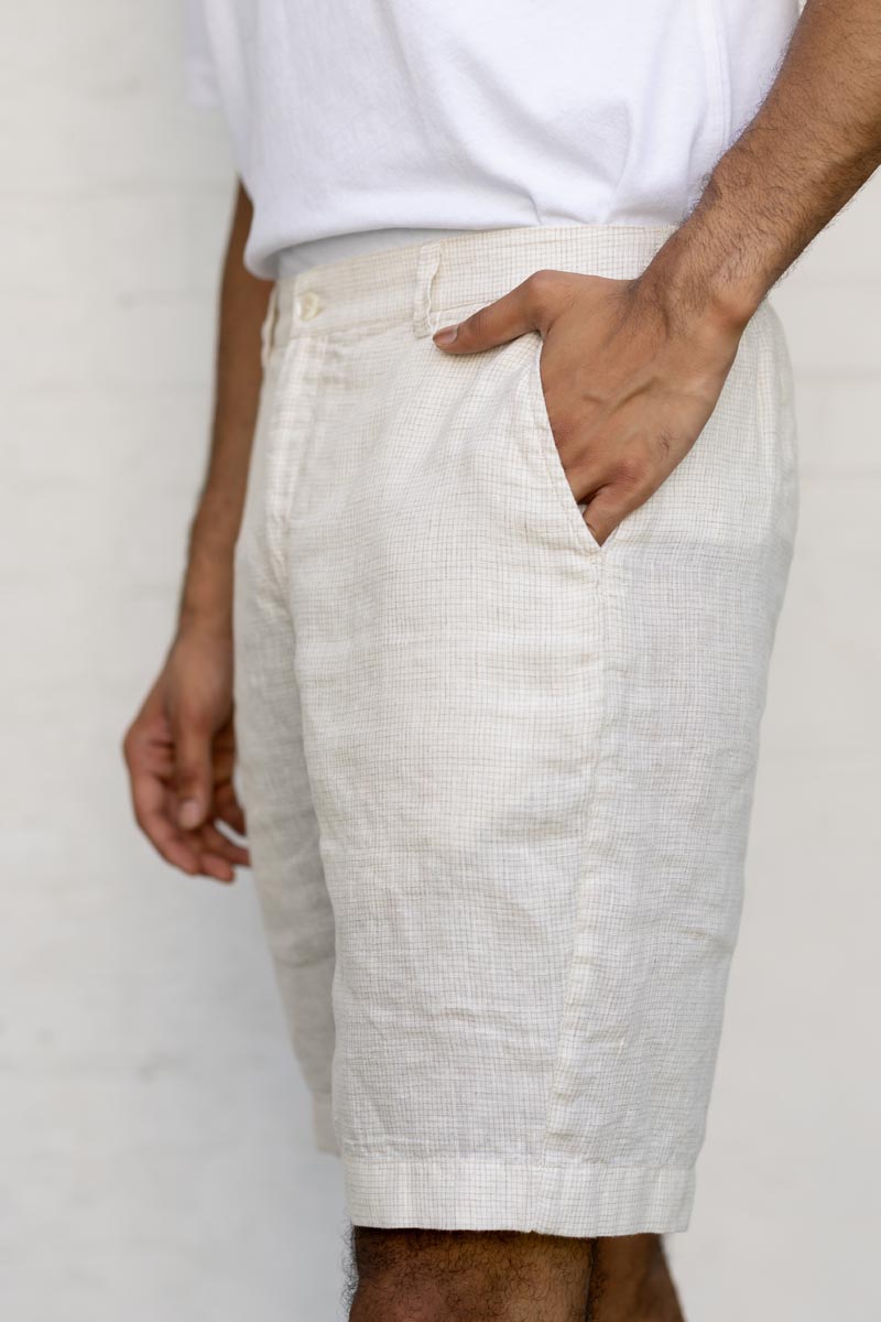 Person wearing Ivory Check Shorts with a plain background