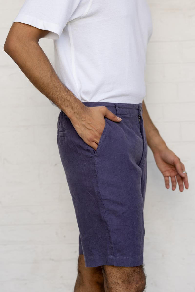 Person wearing Blueberry Shorts and a white shirt against a plain background